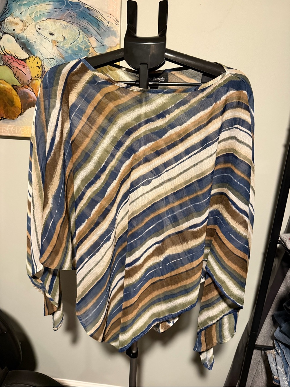 Y2K striped poncho fall colors navy brown olive asymmetrical handkerchief hem